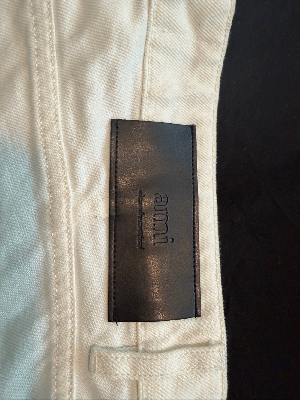 Ami White Denim with Black Leather Logo Patch